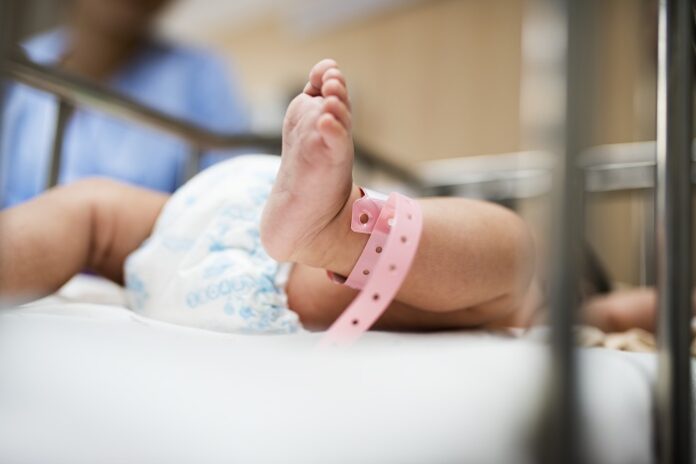 Should We Probe the Genes? The Rising Debate Over Newborn Genome Screening